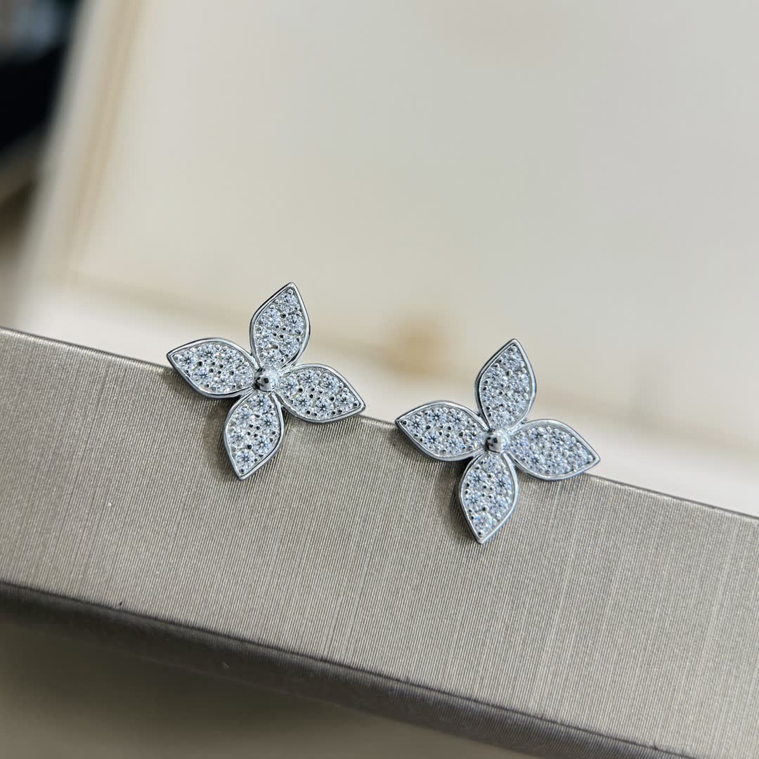 Van Cleef & Arpels Silver Flower Stud Earrings with Diamonds